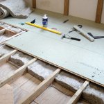 How to insulate the floor in a wooden house from below without opening the floor