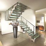 Staircase made of metal and tempered glass