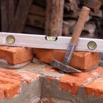 Hammer as a handy tool for drilling walls