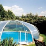 A polycarbonate canopy over the pool is practicality, style and comfort