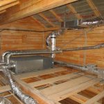 Ventilation system with recuperator in the attic